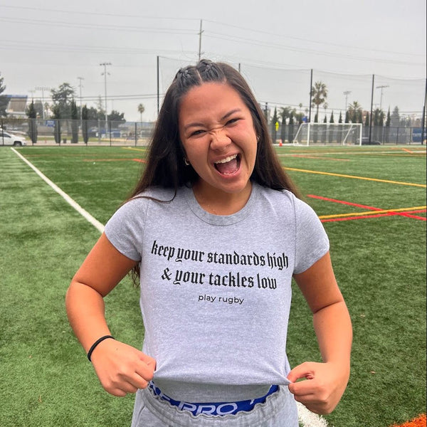 "Keep Your Standards High" – Women’s Baby Tee (Heather Grey) - Modish Rugger