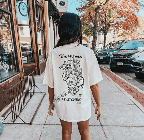 "The World is Watching" Tee - Modish Rugger